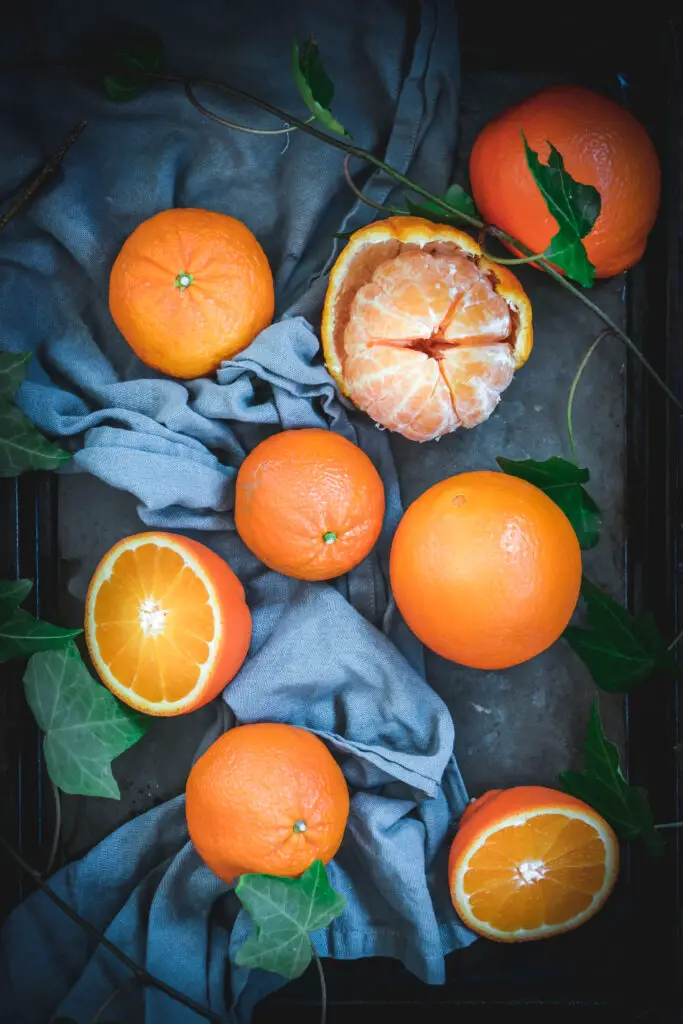 oranges and napkins on a table
