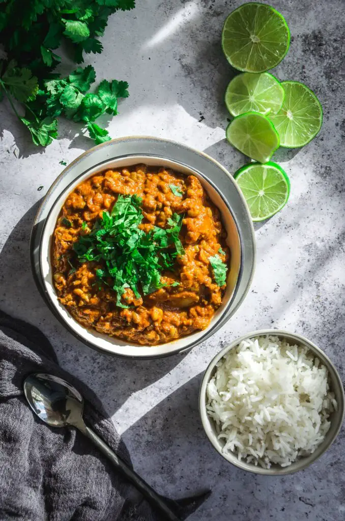 Easy and Healthy Cauliflower Mung Bean Curry on plate with rice and cilantro 