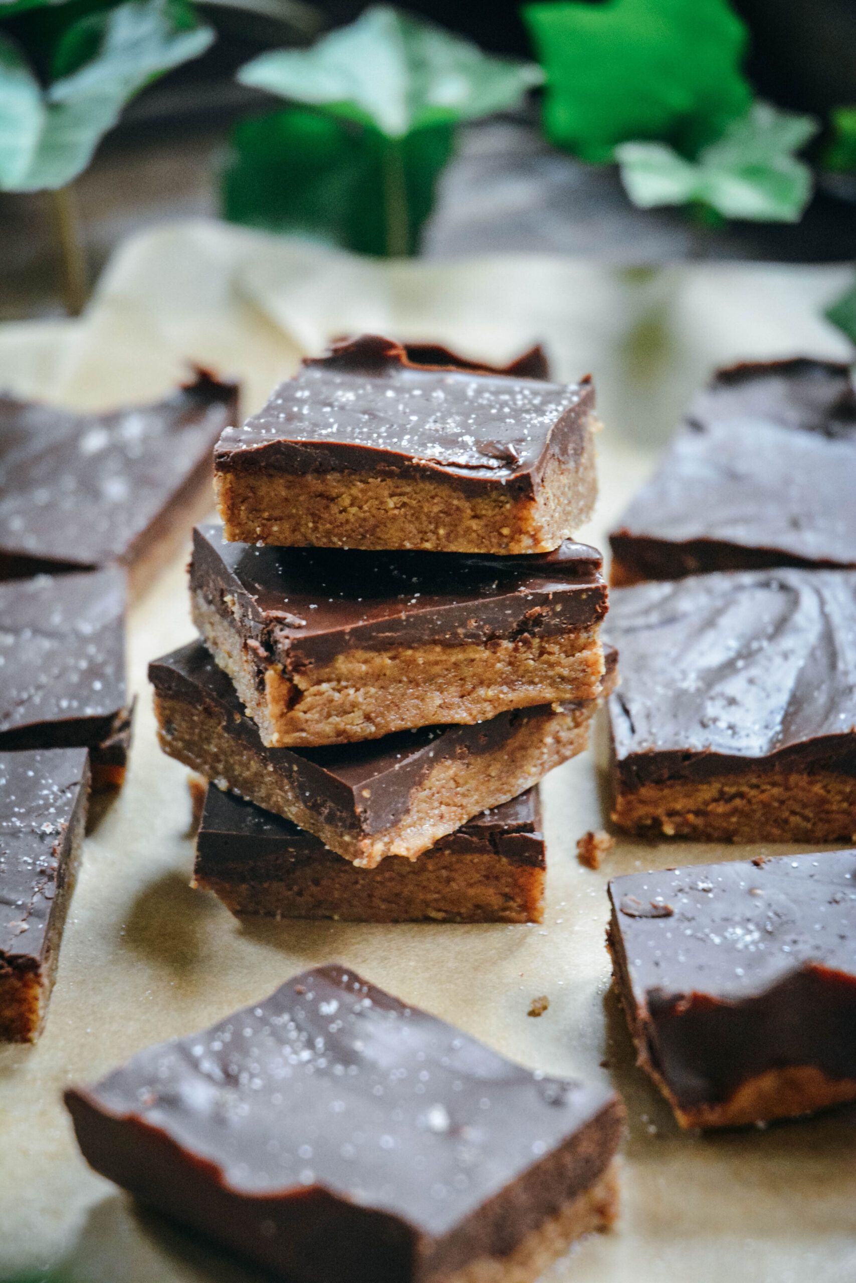 No-Bake Almond Butter Bars with Salted Chocolate squares stacked