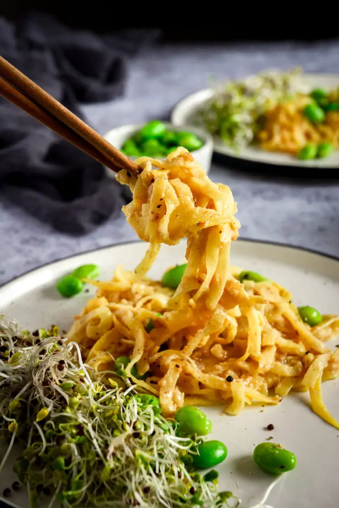 These quick Paleo “Peanut” Noodles are made from rutabaga and are surprisingly similar to actual noodles. They work beautifully with the cashew and tahini sauce to create a creamy vegan and paleo recipe. Check out this 10 minute recipe! #calmeats #vegan #paleo #whole30 #paleopeanutnoodles #peanutnoodles #paleorecipes #grainfreenoodles #glutenfree #dairyfree #rutabaganoodles #tahinisauce