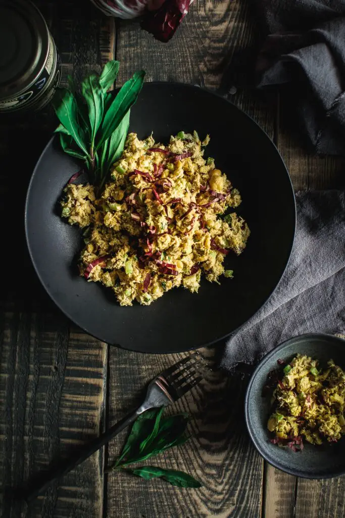  Quick Curried Tuna and Chickpea Salad with Tarragon in black bowl with fork 