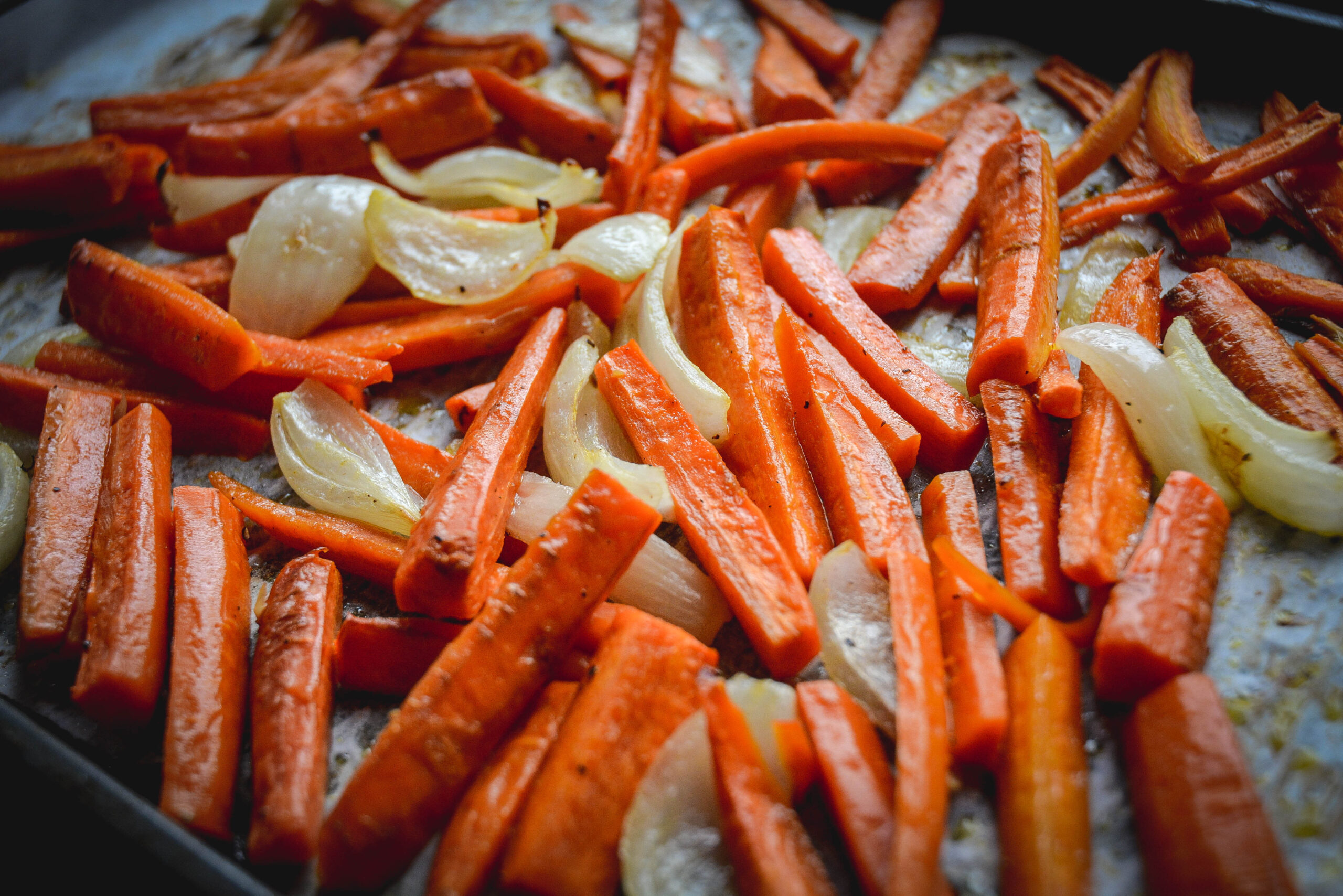 carrots on roasting sheet with onion