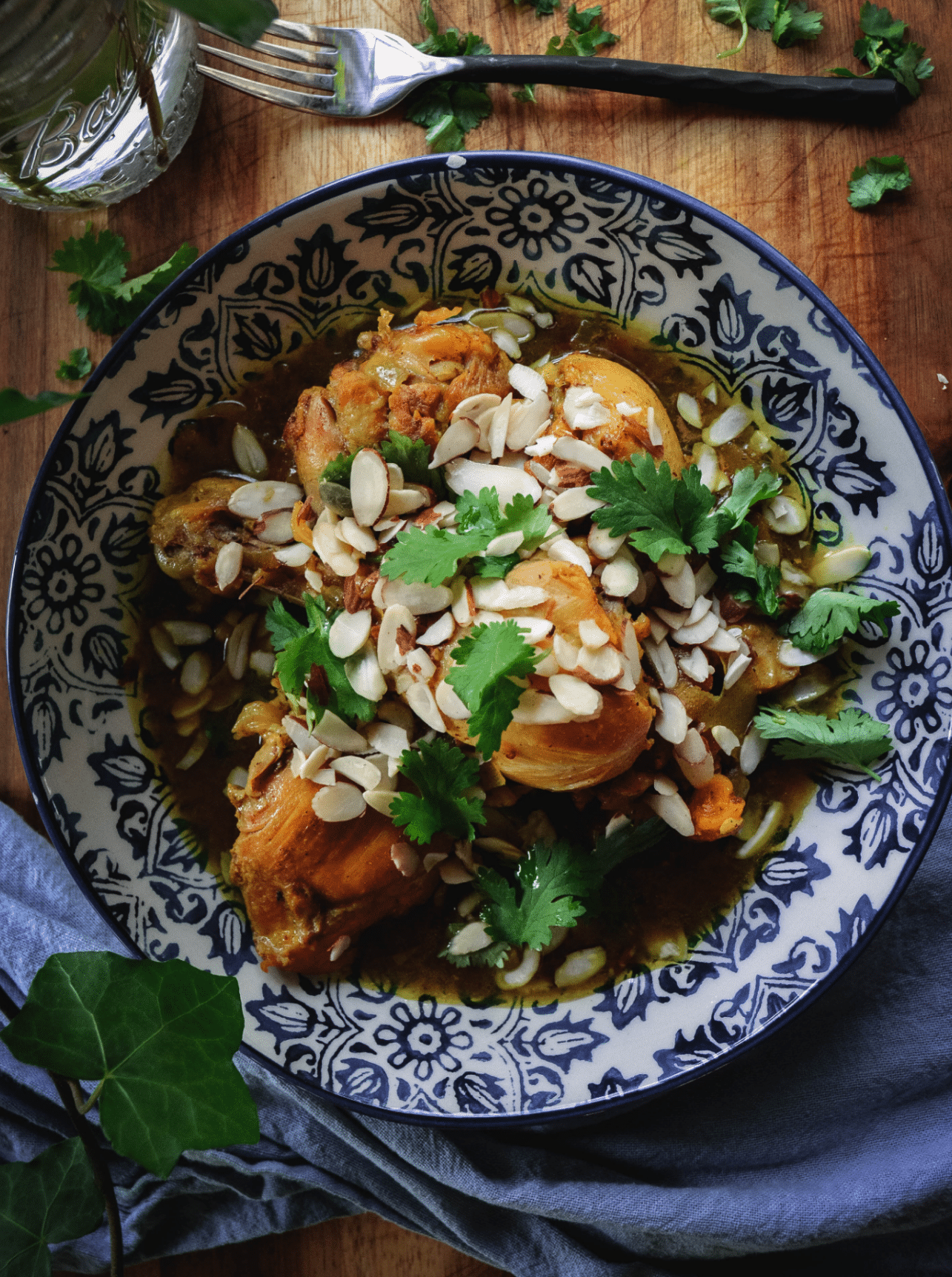 Chicken Tagine with Lemon, Dates and Apricots in dish with cilantro