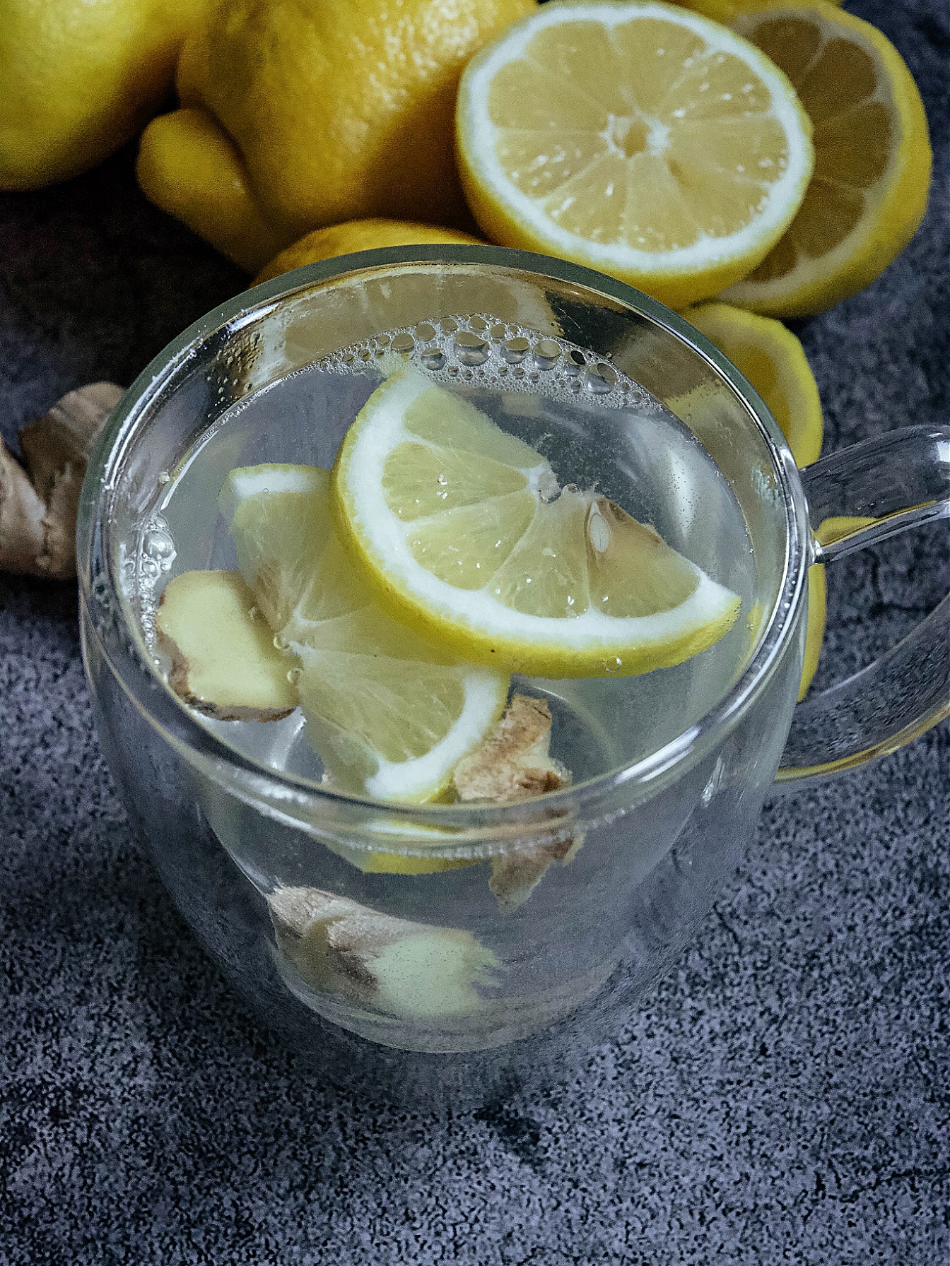 Clear cup with lemon slices