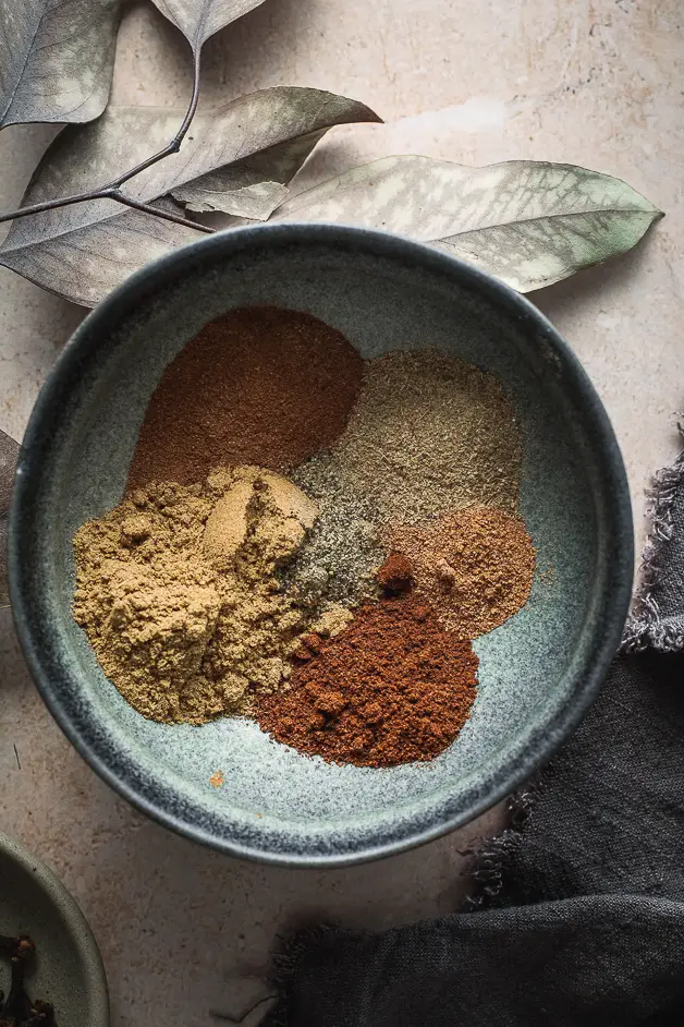 various spices in a blue bowl