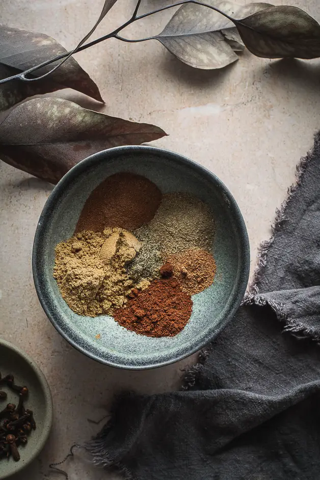 various spices in a blue bowl