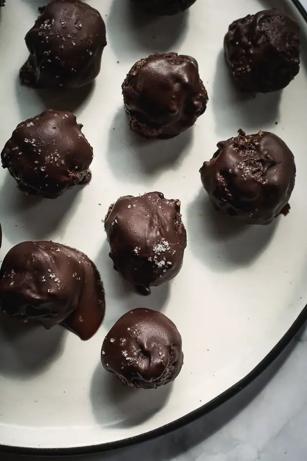 chocolate balls on a white plate