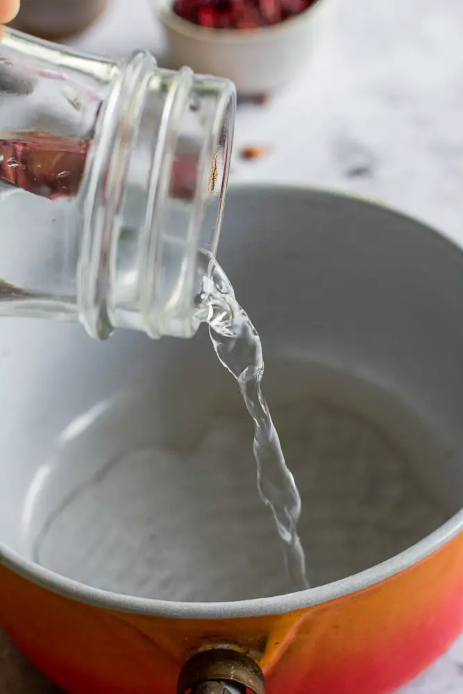 water being poured into a pan