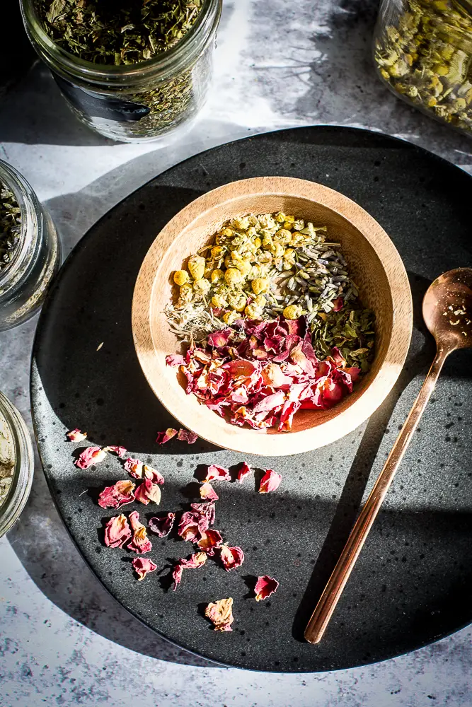 herbs in a little wooden bowl